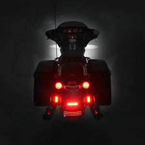 DENALI T3 modular LED rear turn signal pods with red running and brake lights on a motorcycle