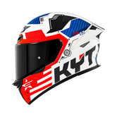 KYT TT Revo Fuselage full face motorcycle helmet in white, red, and blue with a dark tinted visor