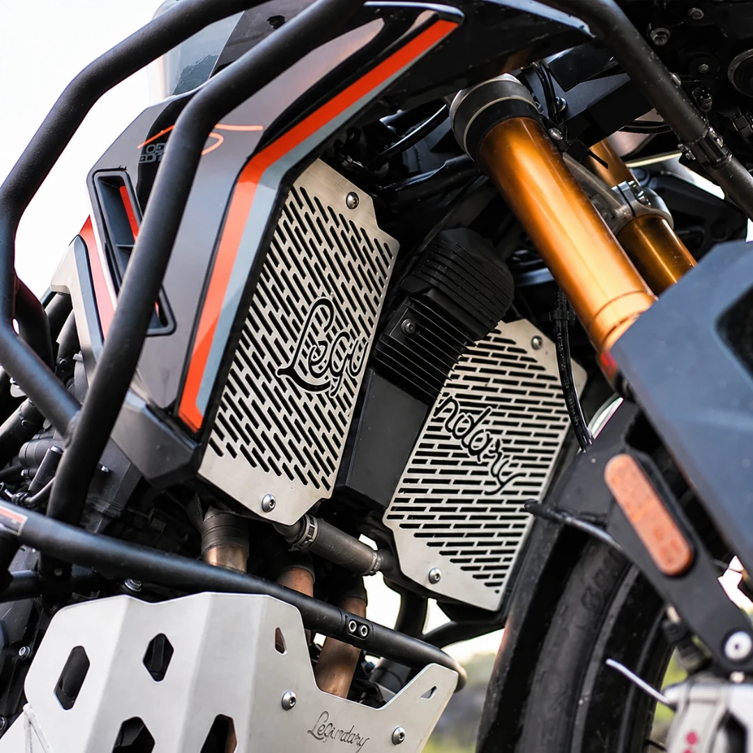 Legundary Vector radiator grill in silver installed on a Triumph Tiger 900 motorcycle