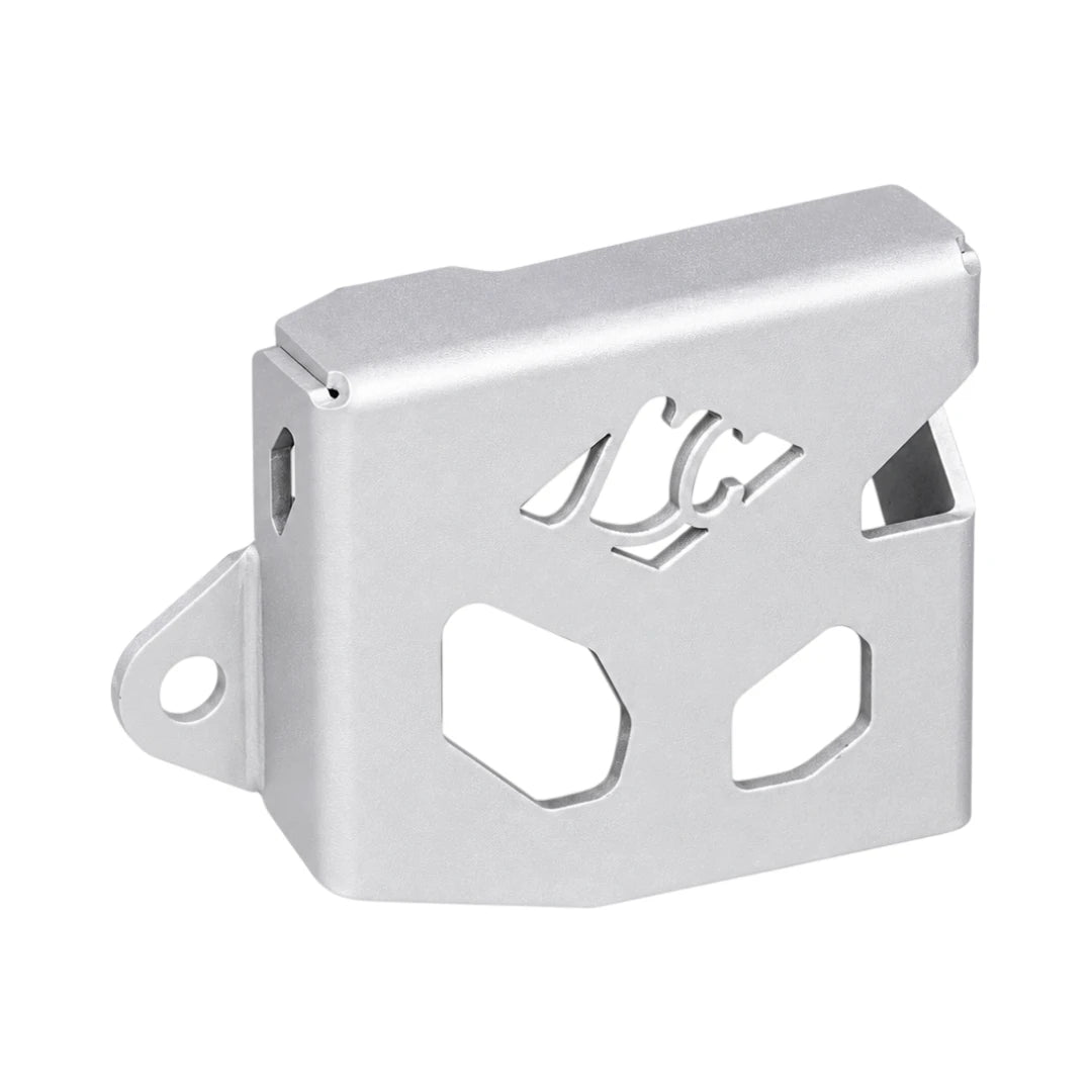 Legundary Triumph Tiger 900 Casque rear oil cap guard in silver aluminium with geometric cutouts, angled view.