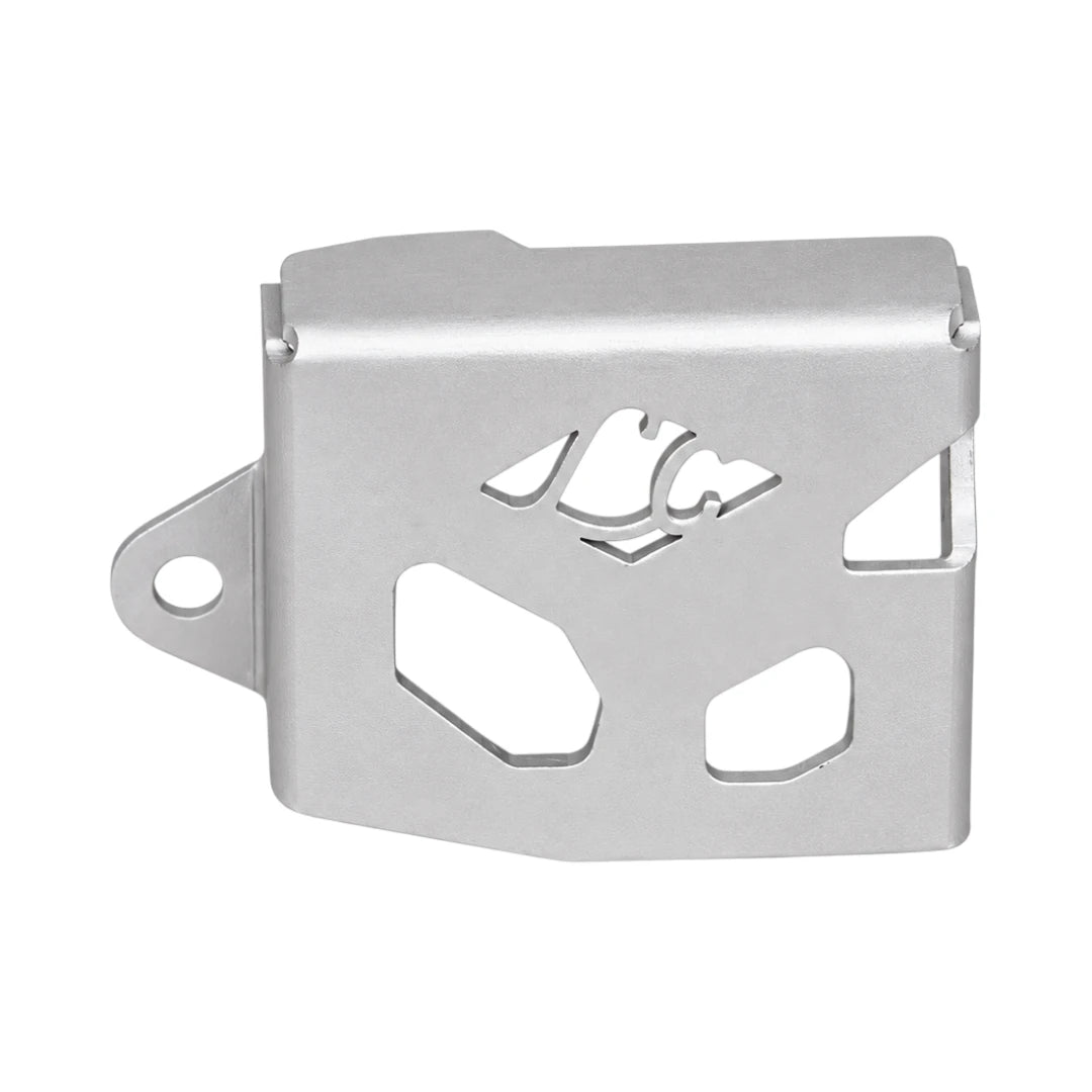 Legundary silver aluminium rear oil cap guard for Triumph Tiger 900 showing geometric openings and side mounting tabs.