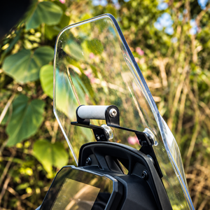 Ploigos GPS mount with visor extender installed on a TVS Apache RTX 300 motorcycle windscreen