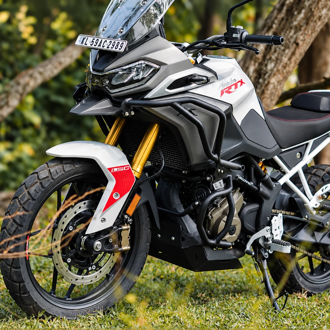 Legundary Raptor upper and lower crash guard set installed on a silver TVS Apache RTX 300 motorcycle