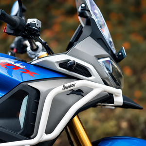 Legundary Raptor white crash guard installed on a blue TVS Apache RTX 300 motorcycle