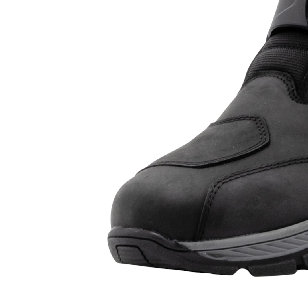 Black buffalo leather adventure motorcycle boots with reinforced toe and durable rubber sole