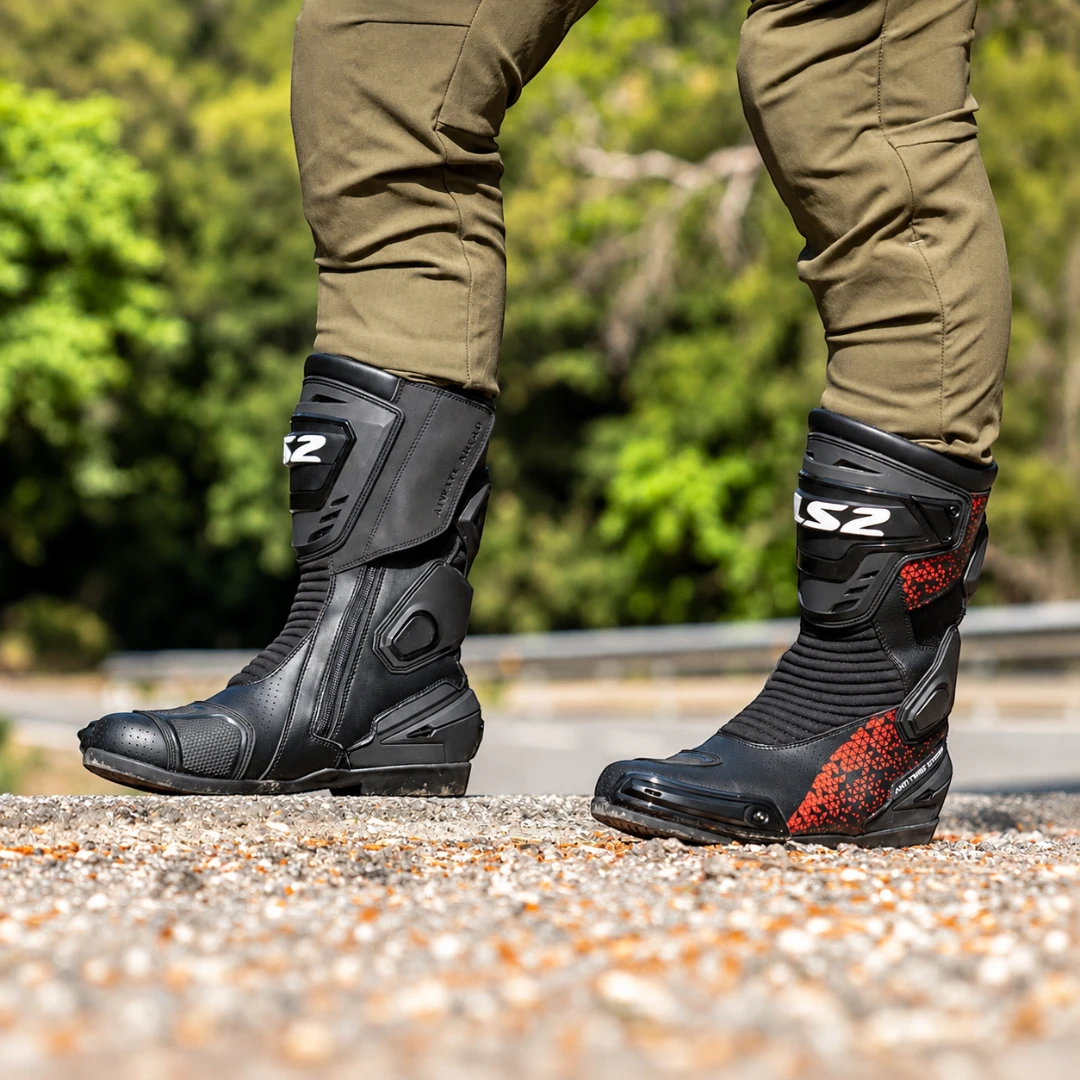LS2 Assault motorcycle boots in black and red, featuring perforated leather and protective TPU elements.