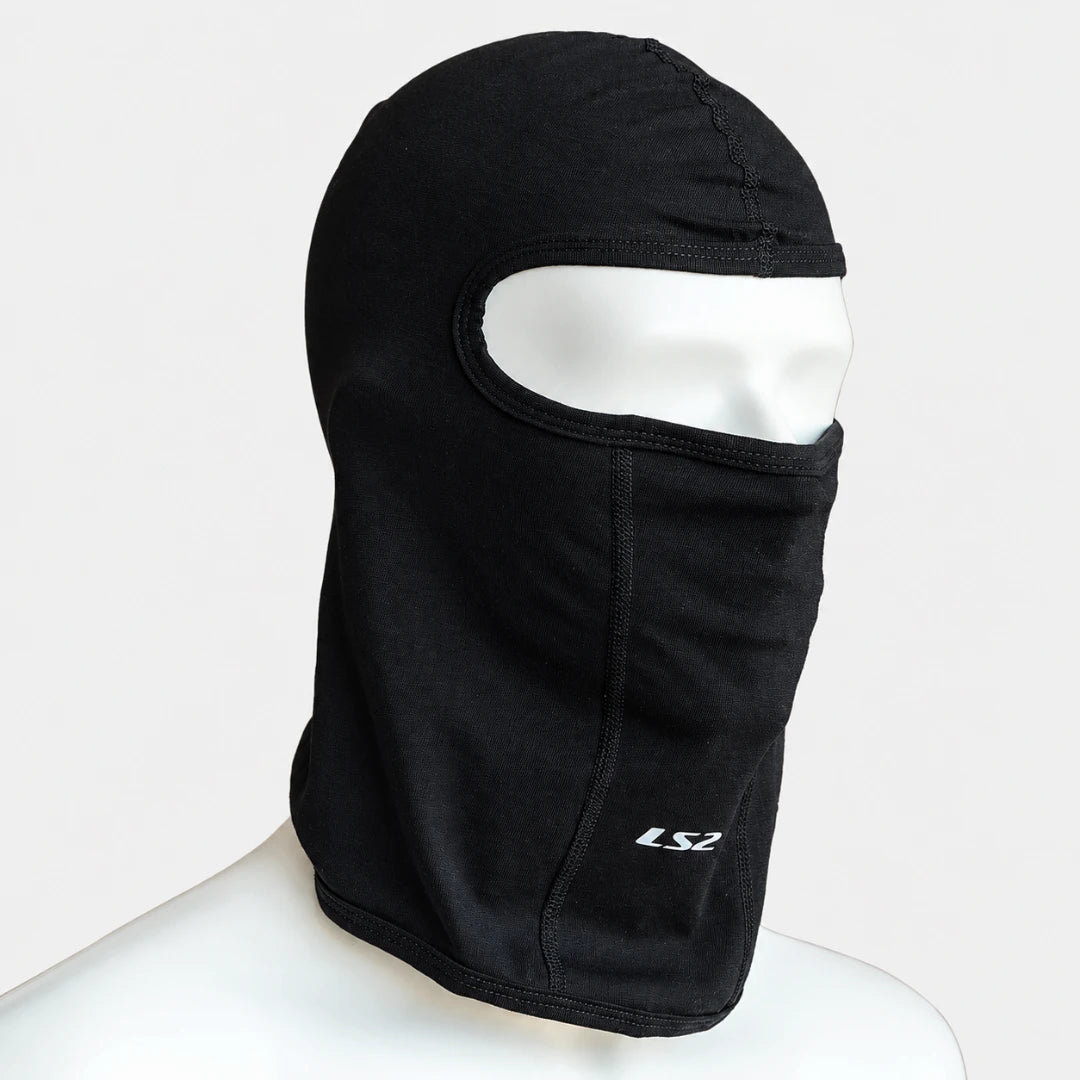 LS2 black cotton motorcycle balaclava on a mannequin head, featuring flatlock seams and a snug fit.