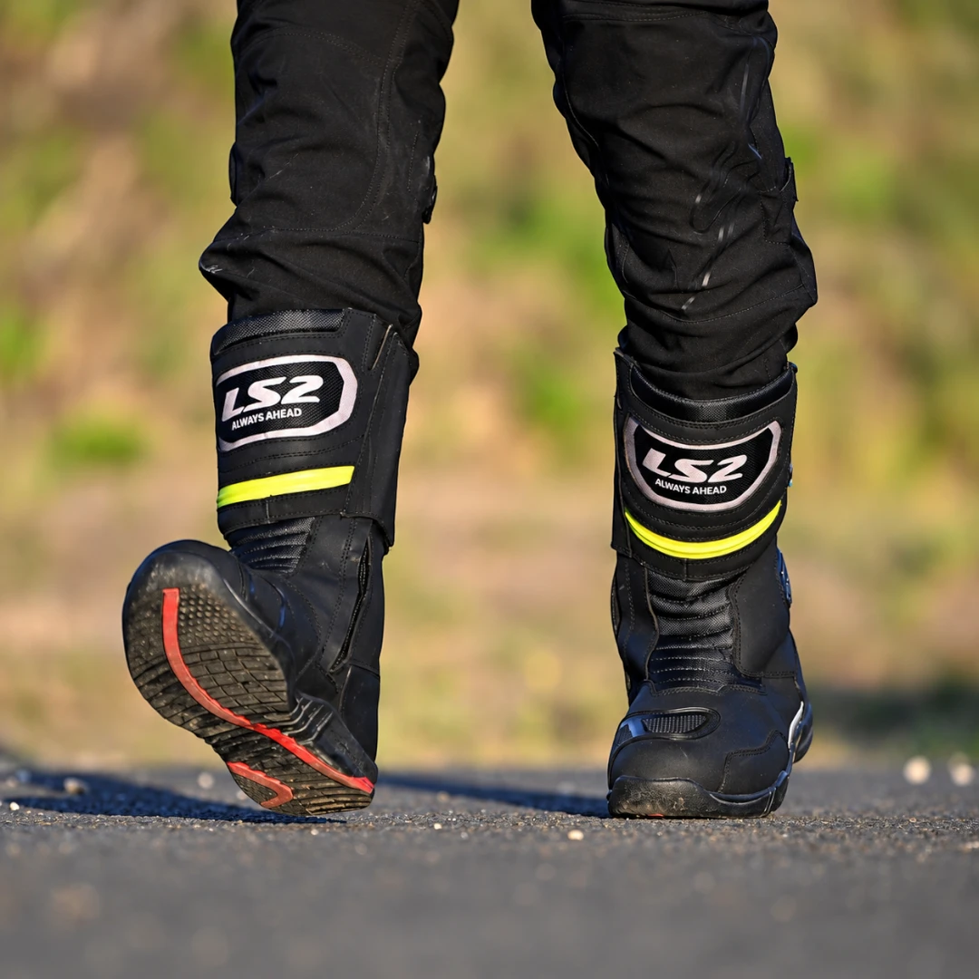 LS2 Goby waterproof black leather motorcycle touring boots with reflective details worn by a rider