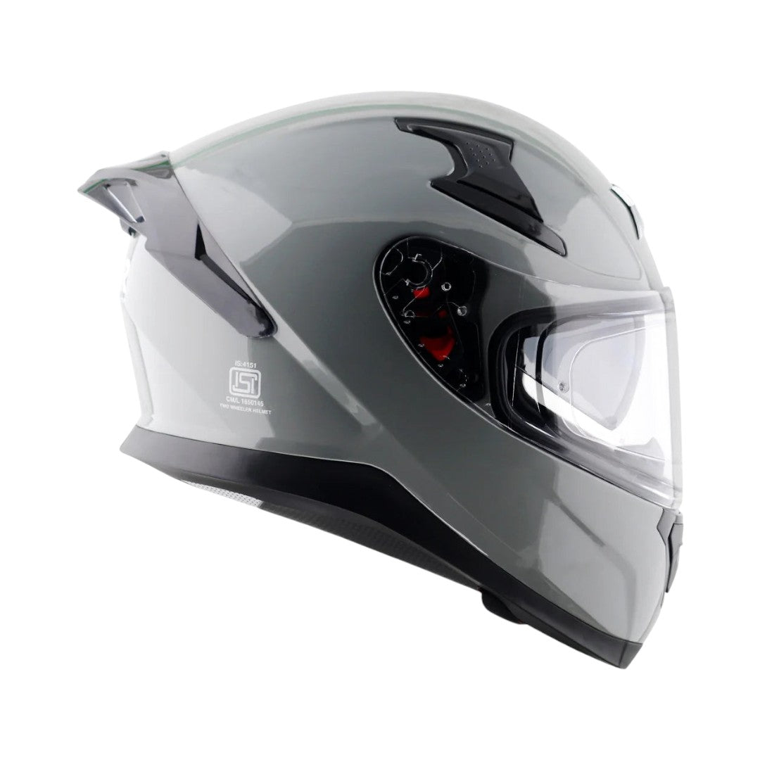 Motodrift Axor Apex Solid full-face motorcycle helmet in glossy grey with a clear visor and aerodynamic design.