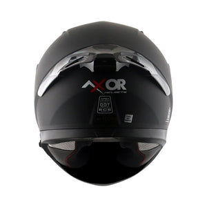 Motodrift Axor Apex solid matte black full-face motorcycle helmet, rear view showing safety certification labels.