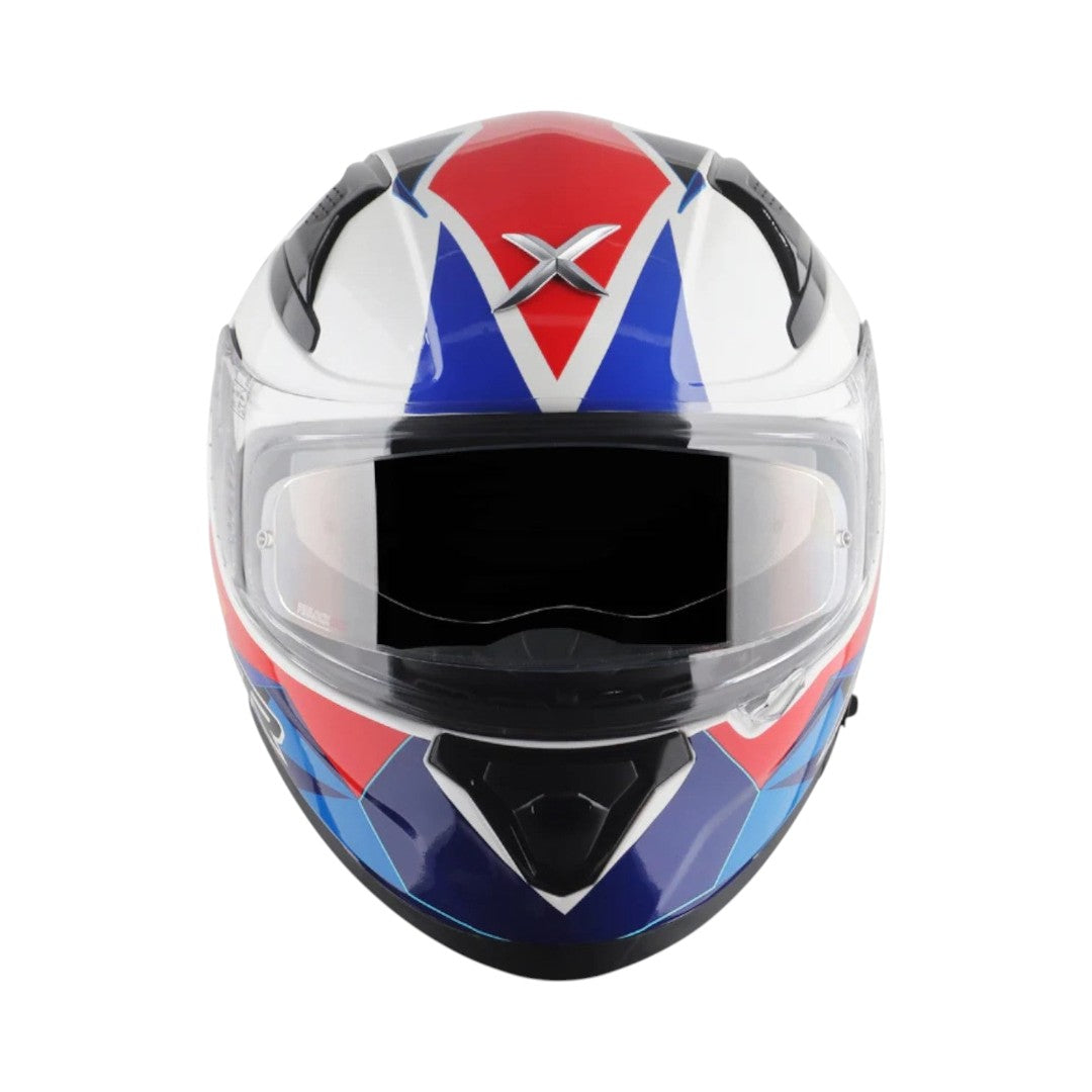 Motodrift Axor Apex Prism full-face motorcycle helmet in white, red, and blue with a clear visor and angular graphics.