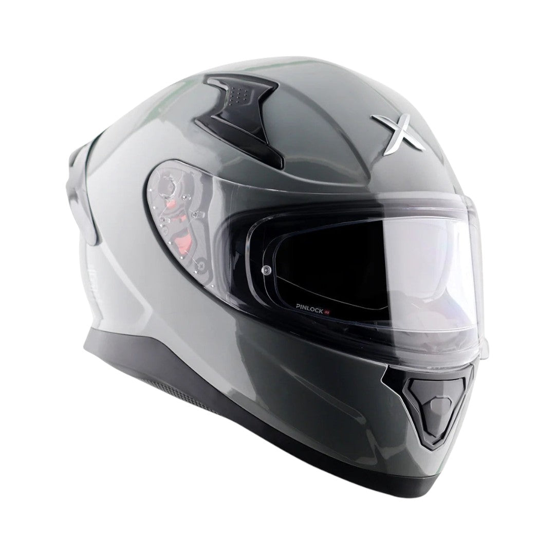 Motodrift Axor Apex Solid full-face motorcycle helmet in glossy grey with a clear visor and aerodynamic design.