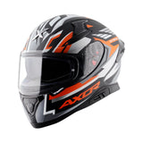 Motodrift Axor Apex Streak full-face motorcycle helmet in black, grey, and orange with futuristic prism graphics.