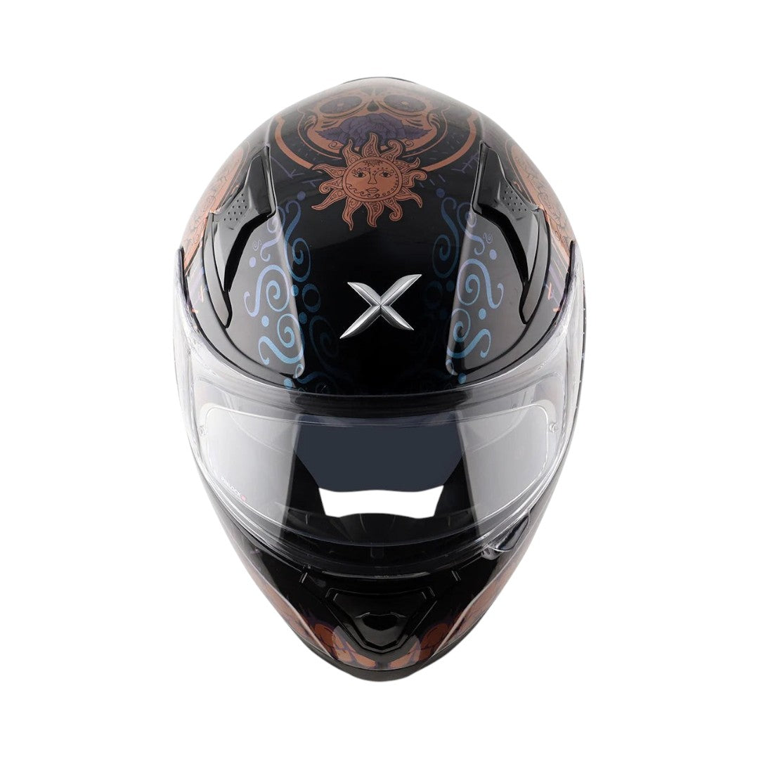 Motodrift Axor Apex Trance full-face helmet in black with intricate sun and swirl graphic details, front view.