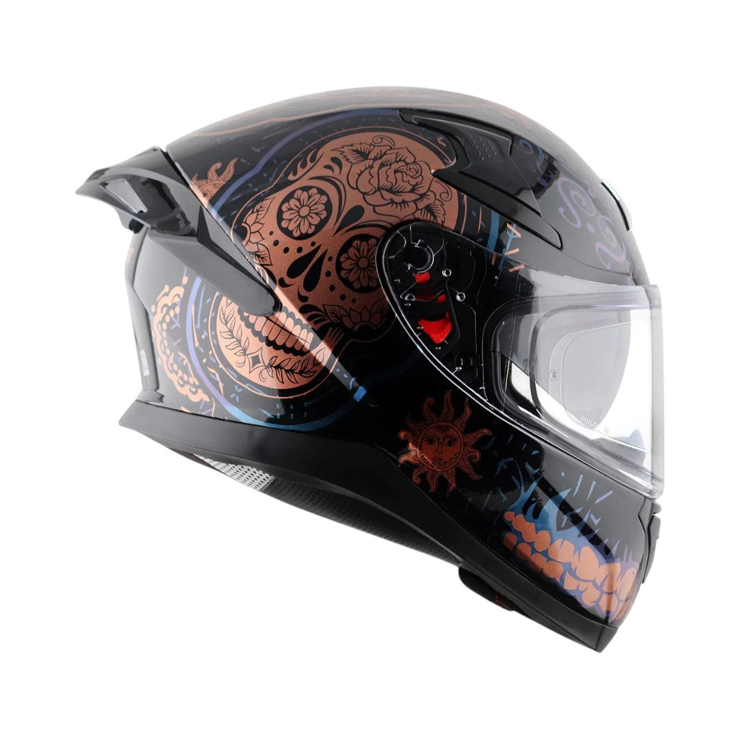 Motodrift Axor Apex Trance full-face helmet in black with copper skull and floral graphic design, side profile view.