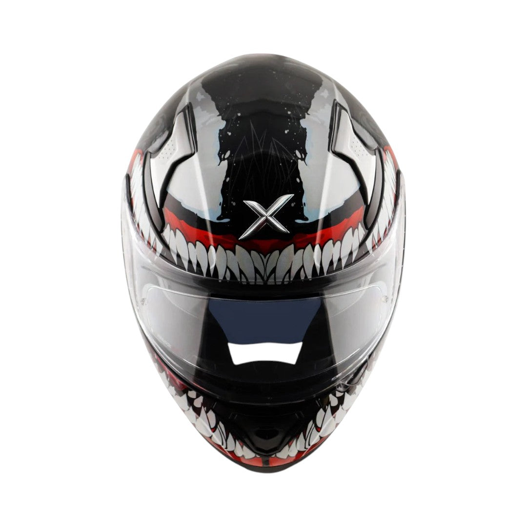 Motodrift Axor Apex Marvel Venom full-face motorcycle helmet with black and white graphic design and clear visor