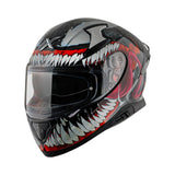 Motodrift Axor Apex Marvel Venom full-face motorcycle helmet with black, white, and red graphic design.