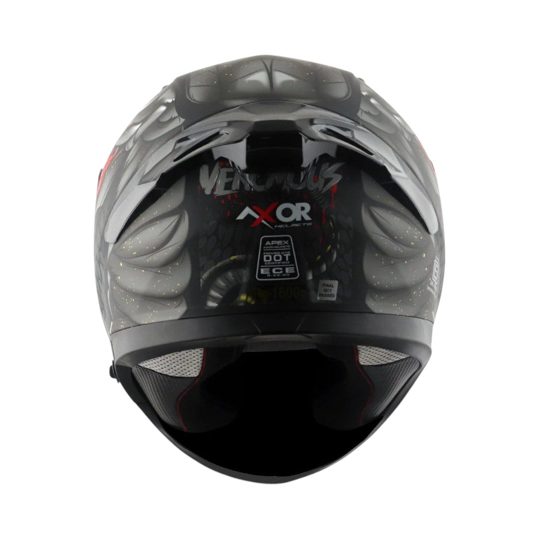 Motodrift Axor Apex Venomous helmet rear view showing integrated spoiler, safety certifications, and graphic design