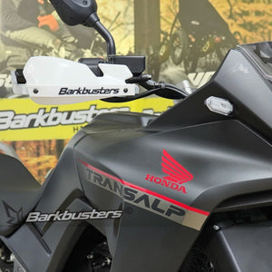 Motodrift Barkbusters two point mount hardware kit installed on a Honda XL 750 Transalp with white handguards