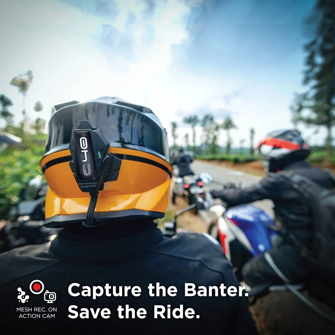 Motodrift BluArmor C40 Bluetooth mesh intercom mounted on the back of a yellow motorcycle helmet during a group ride