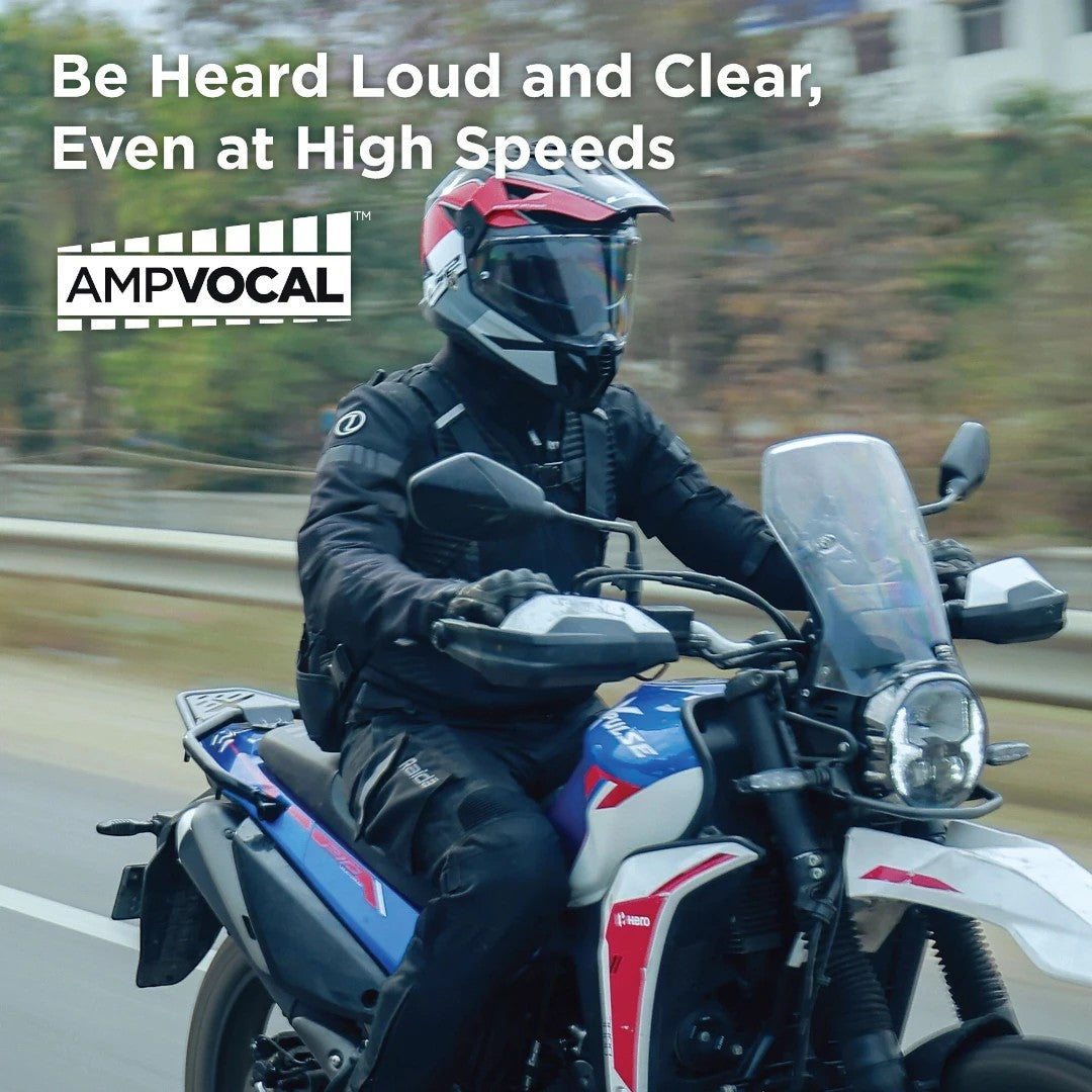 Motodrift BluArmor C40 Bluetooth mesh intercom mounted on a motorcycle helmet during a high-speed ride