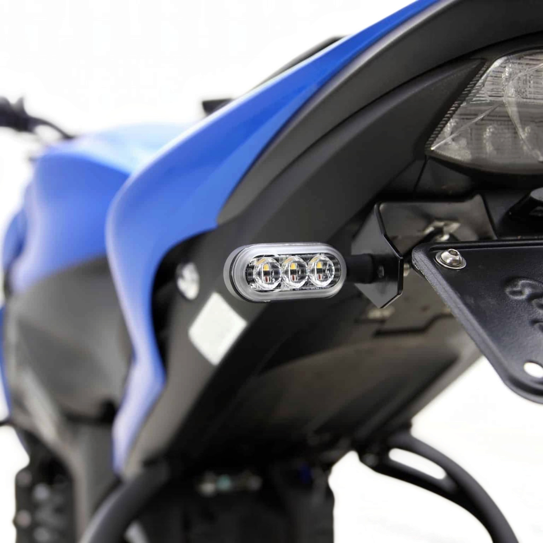 Motodrift DENALI T3 switchback LED pod mounted on the rear of a motorcycle for brake and turn signal visibility