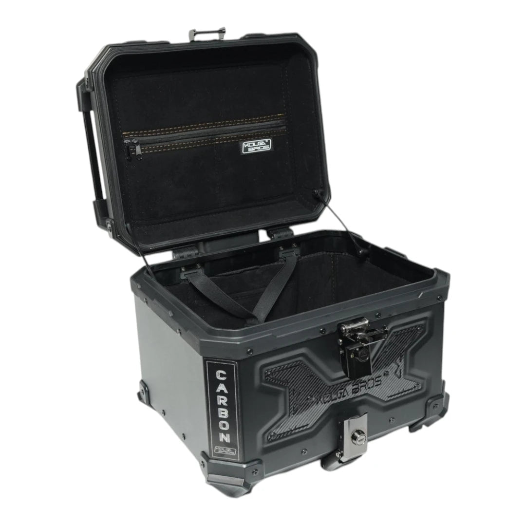 Motodrift KOLGA BROS Carbon aluminium motorcycle top box with open lid and black leather-finish interior lining.