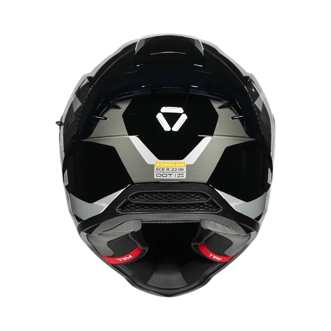 Rear view of Motodrift Korda Evo Chief full-face motorcycle helmet featuring aerodynamic spoiler and safety labels