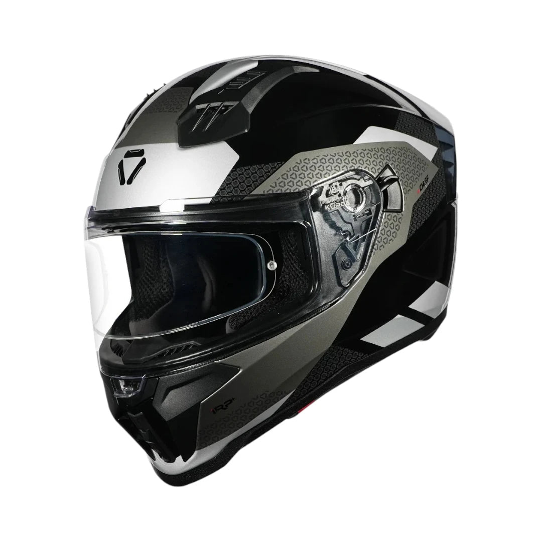 Motodrift Korda Evo Chief full-face motorcycle helmet in black and silver with aerodynamic spoiler and clear visor