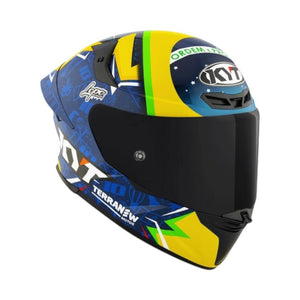 Motodrift KYT TT Revo Diogo Moreira replica motorcycle helmet featuring vibrant yellow, blue, and green racing graphics.