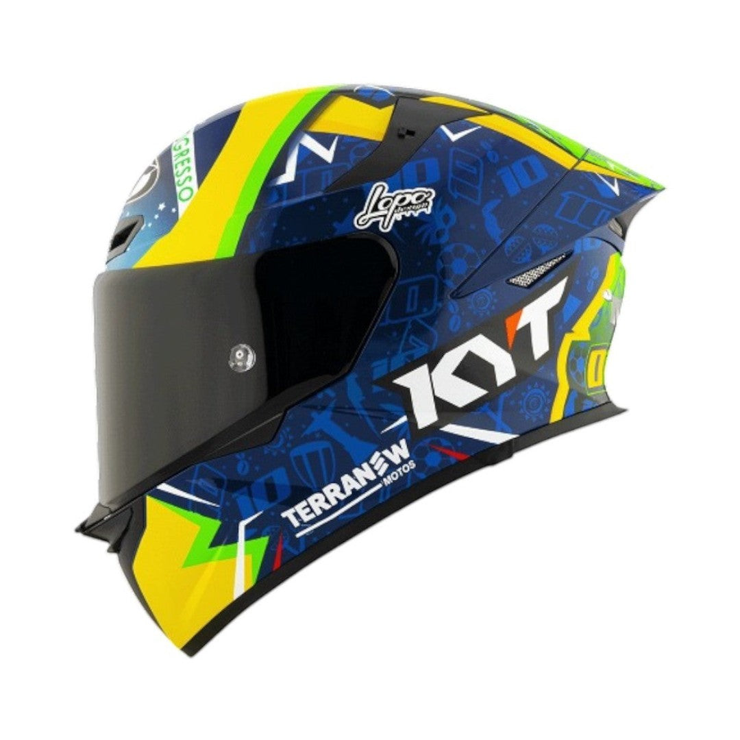 Motodrift KYT TT Revo Diogo Moreira replica helmet in blue, yellow, and green with aerodynamic racing graphics.
