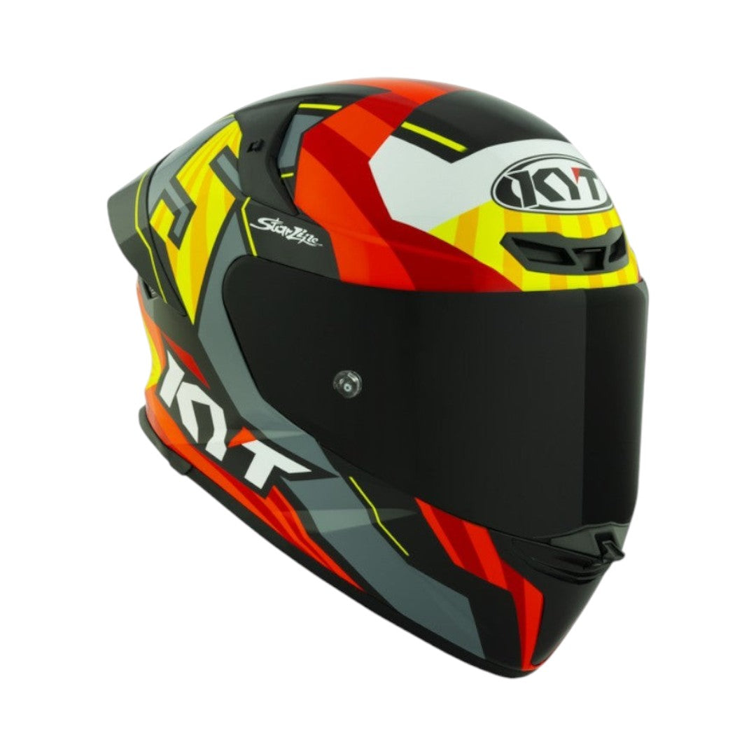 Motodrift KYT TT Revo Flux full-face motorcycle helmet in a glossy multi-color graphic design with aerodynamic spoiler.