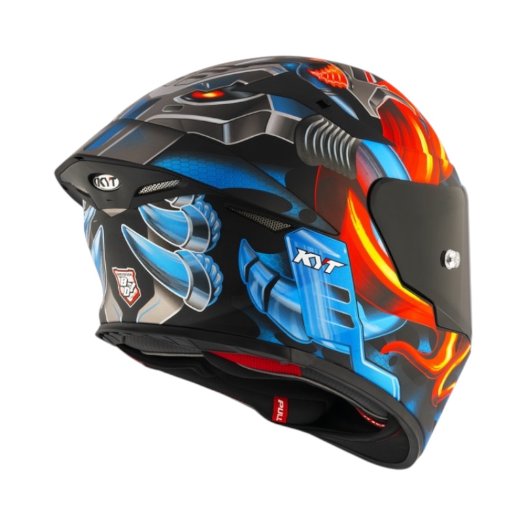 Motodrift KYT TT Revo Magnet matte motorcycle helmet with vibrant blue and red graphic design and aerodynamic spoiler