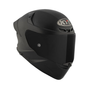 Motodrift KYT TT Revo Plain matte black sport touring helmet with a dark tinted visor and aerodynamic shell design.