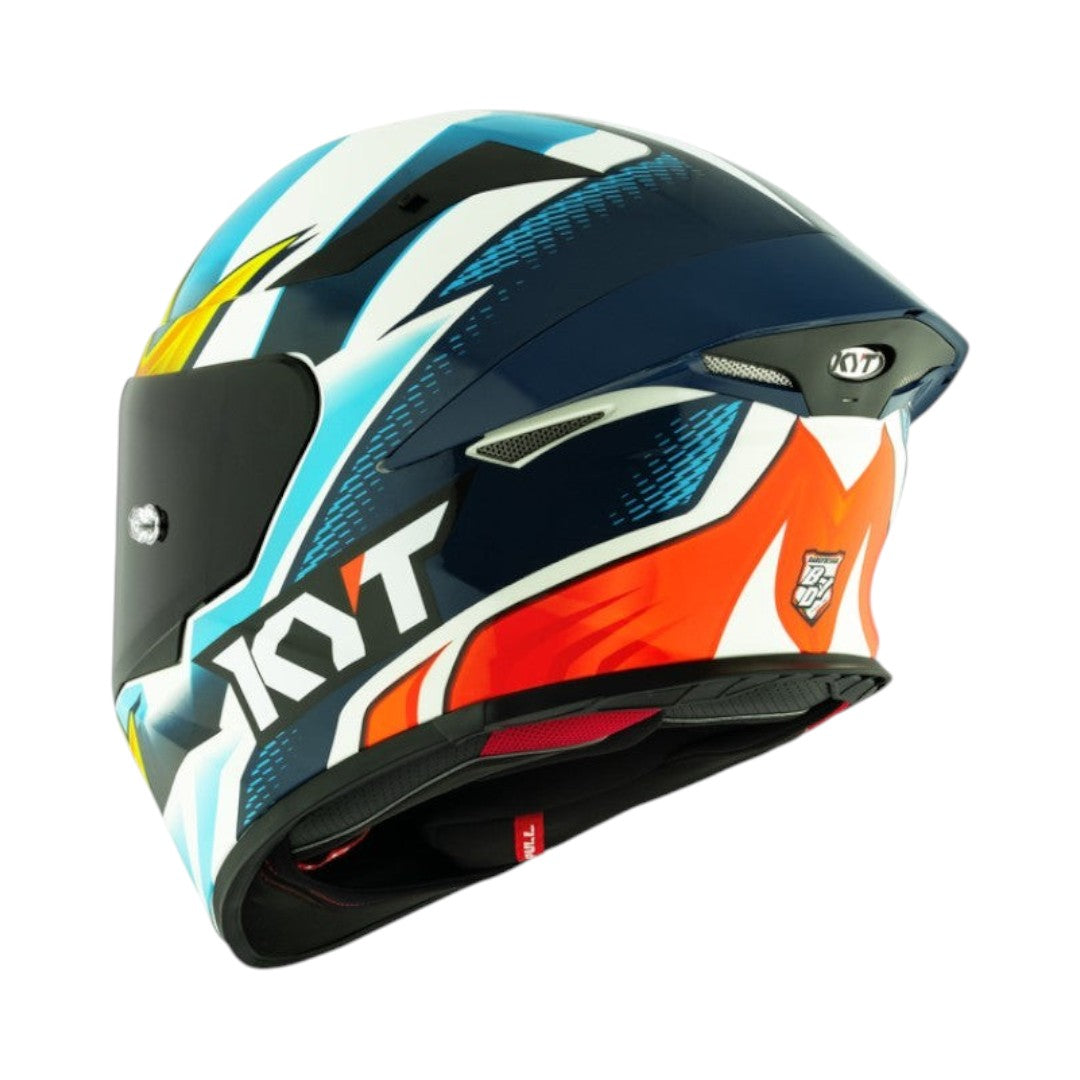 Motodrift KYT TT Revo Tati Replica full-face motorcycle helmet with aerodynamic blue, white, and orange graphics