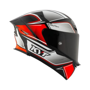 Motodrift KYT TT Revo Tourist motorcycle helmet in black, red, and silver with aerodynamic design and tinted visor