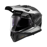 Motodrift LS2 MX436 Pioneer II dual-sport helmet in gloss black and light grey with an adjustable peak and sun visor.