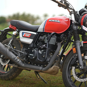 Motodrift Moto Torque V2.0 black steel crash guard installed on a red Honda CB350 RS motorcycle