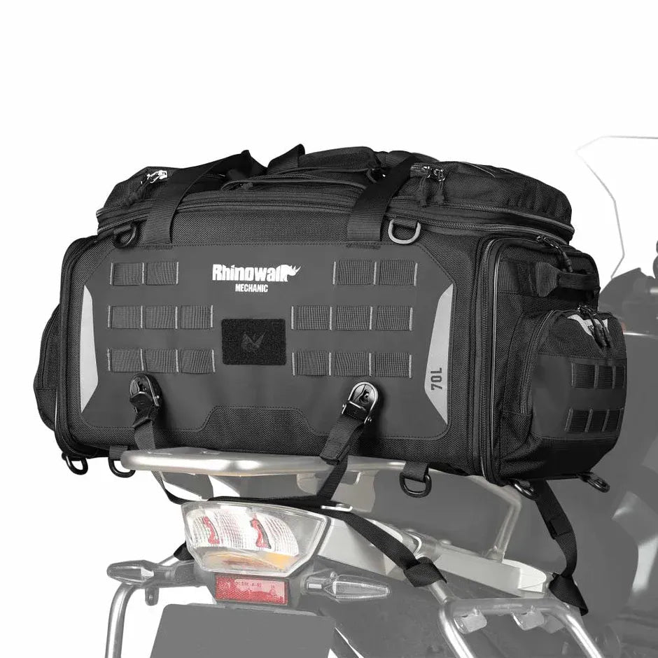 Motodrift Rhinowalk black expandable motorcycle tail seat bag mounted on a bike for touring and adventure travel.