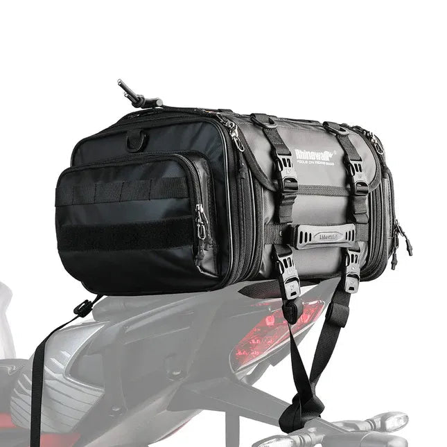 Motodrift Rhinowalk 50L expandable black motorcycle tail seat bag mounted on a bike for touring and travel gear.