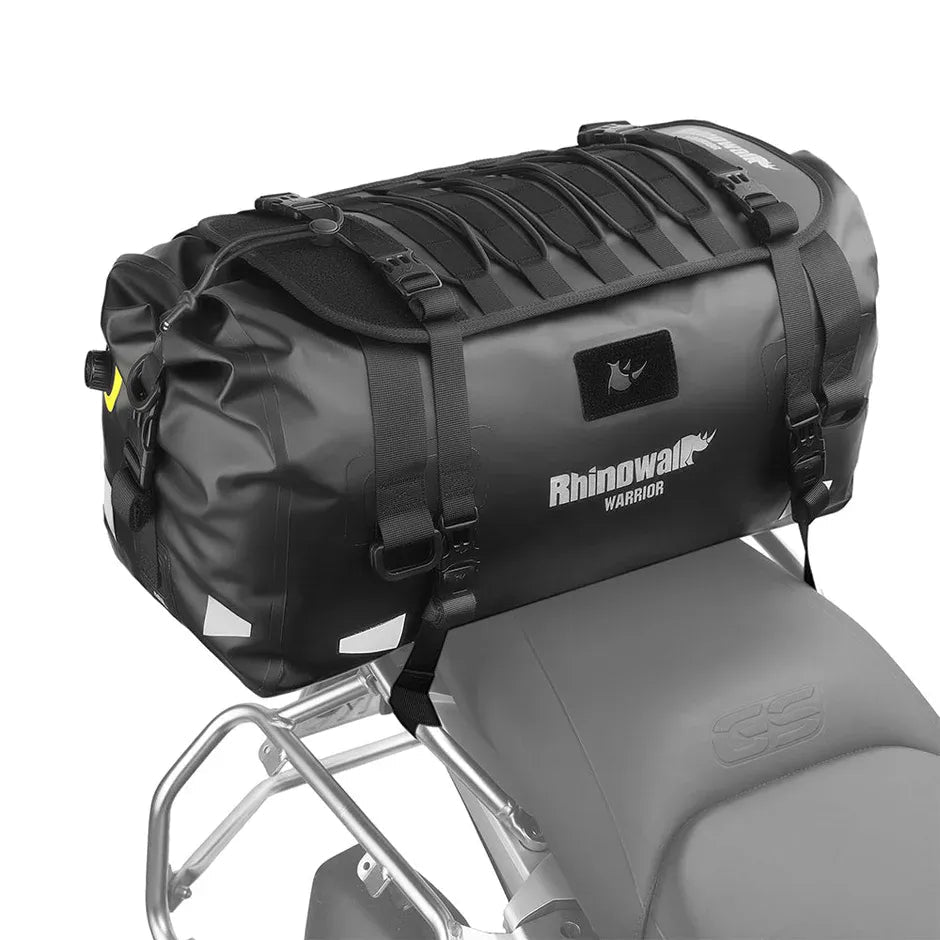 Motodrift Rhinowalk Warrior waterproof motorcycle roll-top duffel bag in black mounted on a bike seat