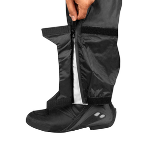 Motodrift Rynox H2GO PRO black waterproof rain pant leg with YKK Aquaguard side zipper over a motorcycle boot