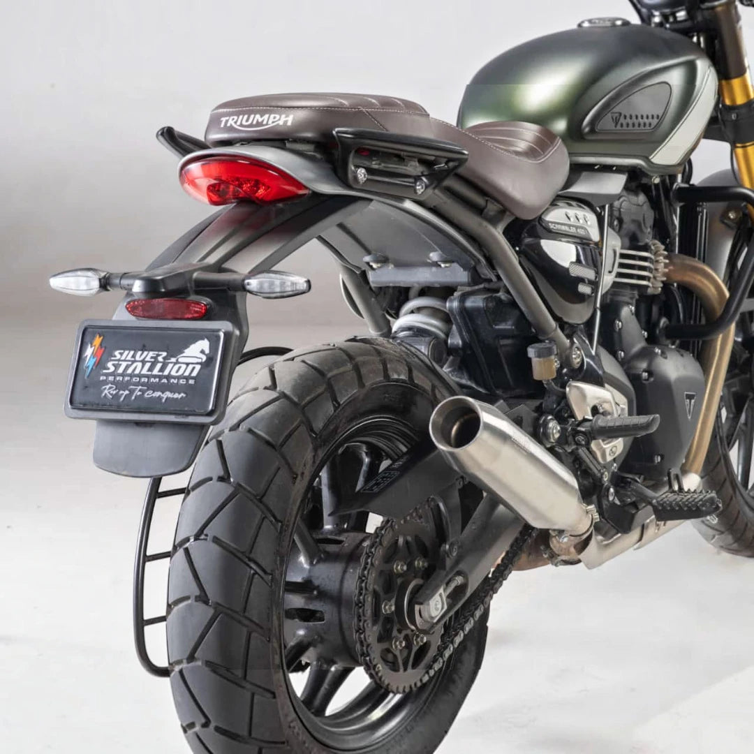 Motodrift Silver Stallion Blaze performance exhaust installed on a Triumph Scrambler 400X motorcycle rear view
