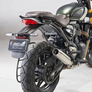 Motodrift Silver Stallion Blaze performance exhaust installed on a Triumph Scrambler 400X motorcycle rear view