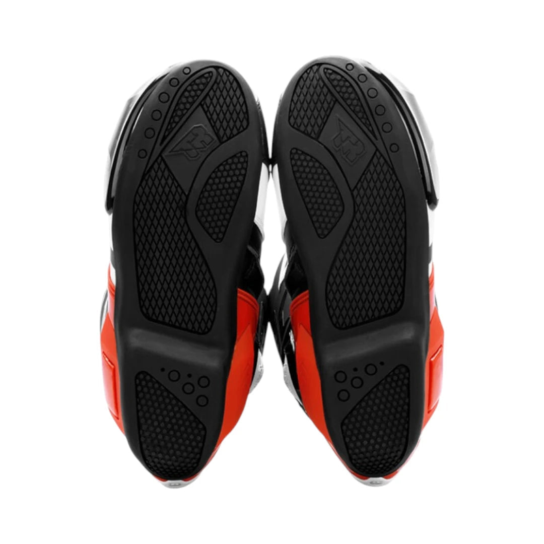 Motodrift TR Tiger X-ONE PRO motorcycle boots showing the high-density composite rubber soles with textured grip