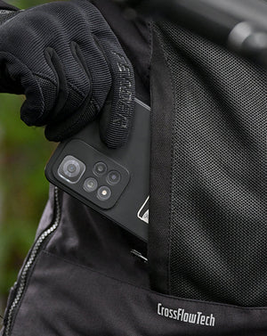 Motodrift ViaTerra Ellis women's riding jacket featuring a functional pocket and CrossFlowTech breathable mesh fabric.