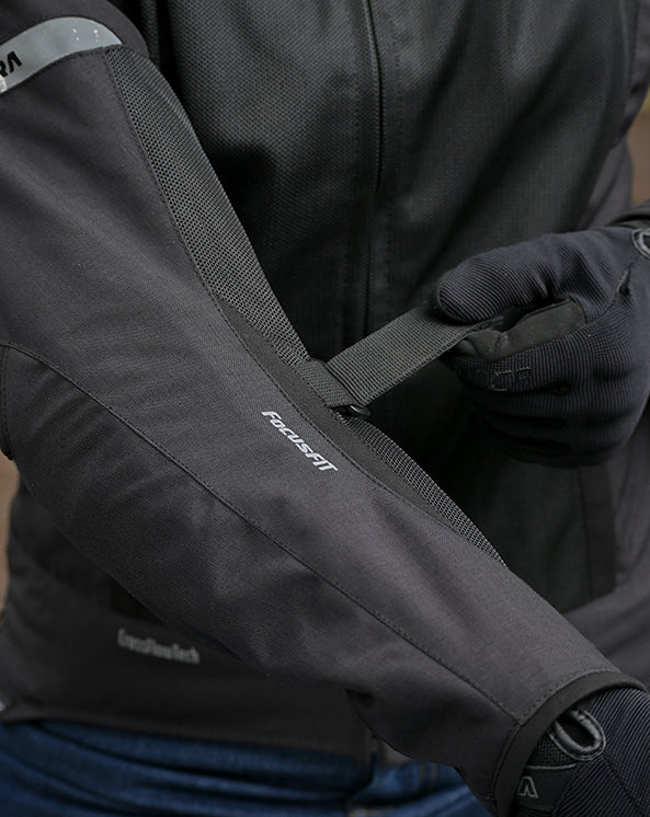 Motodrift ViaTerra Ellis women's black riding jacket sleeve with adjustable strap and FocusFit technology detail