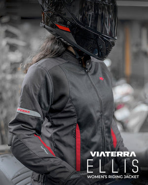 Motodrift ViaTerra Ellis women's black riding jacket with red accents and reflective details worn by a rider