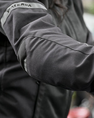 Motodrift ViaTerra Ellis women's black riding jacket featuring reinforced elbow protection and reflective detailing.