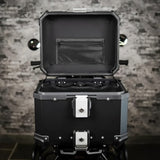 Motodrift ZANA 45L aluminium motorcycle top box in black and silver with open lid and internal storage pocket
